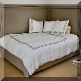 F41. Custom built queen corner bed. 64”h 
